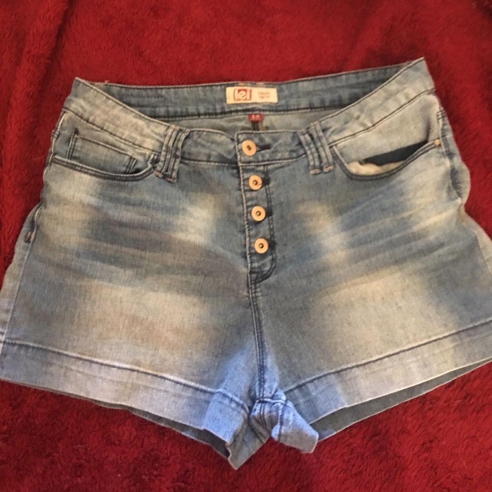 l.e.i  high rise faded light blue jean shorts.